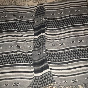 Gray, black, and white poncho